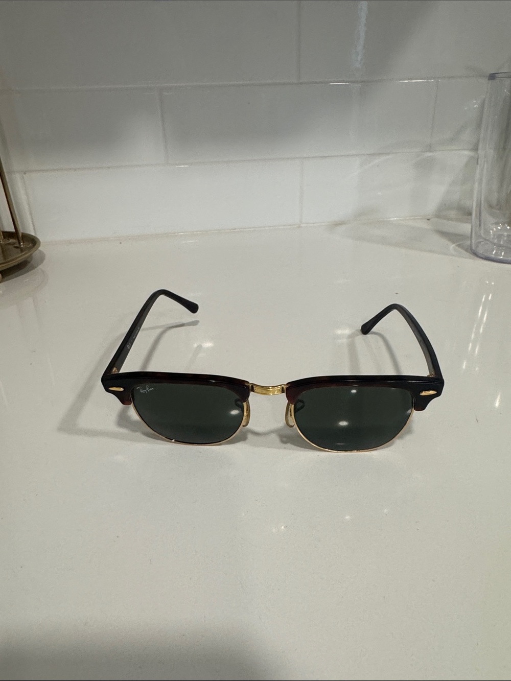 Ray-Ban Tortoiseshell Black Frame Sunglasses with Gold Accents and Green Lenses